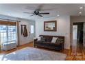 Bright living room with hardwood floors and comfy seating at 300 Pine Meadows Cir, Hickory, NC 28601