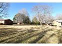 View of the backyard showing a large grassy area at 412 Princeton Dr, Salisbury, NC 28144