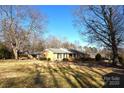 Ranch style home with a spacious yard and driveway at 412 Princeton Dr, Salisbury, NC 28144