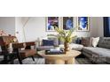 Bright and airy living room with sectional sofa and large windows at 6027 Pivot Ct, Charlotte, NC 28205