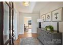 Bright entryway with hardwood floors and decorative accents at 7135 Folger Dr, Charlotte, NC 28270