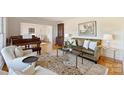 Spacious living room with hardwood floors and neutral decor at 7135 Folger Dr, Charlotte, NC 28270