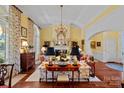 Elegant living room featuring hardwood floors and a fireplace at 104 Lazenby Dr, Fort Mill, SC 29715