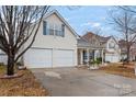 Nice curb appeal! This charming house features a two-car garage and covered porch at 109 Copes Ct, York, SC 29732