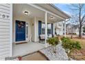 Relaxing front porch with rocking chairs and tasteful decor at 109 Copes Ct, York, SC 29732