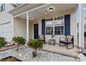 Inviting front porch with rocking chairs, perfect for relaxing at 109 Copes Ct, York, SC 29732