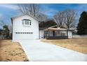 Modern two-story home with white exterior, attached garage, and a long driveway at 139 Elysian Dr, Mooresville, NC 28117