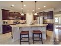 Spacious kitchen with island, granite countertops, and dark cabinets at 156 Carmen Way, Lancaster, SC 29720