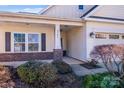 Inviting exterior of charming ranch home with front porch at 2706 White Pines Ct, Monroe, NC 28112