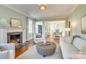 Spacious living room featuring a fireplace and ample natural light at 2912 Park Rd, Charlotte, NC 28209