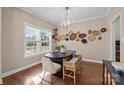 Bright dining room featuring a black table, neutral walls, and a basket wall decor at 4119 Flint Dr, Lancaster, SC 29720