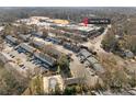 Aerial view of townhouses near Harris YMCA with a pool at 5915 Quail Hollow Rd # E, Charlotte, NC 28210