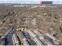 Aerial view of townhouses near SouthPark Mall with a pool at 5915 Quail Hollow Rd # E, Charlotte, NC 28210