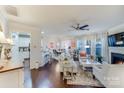 Spacious living room featuring hardwood floors, fireplace, and open floor plan at 6417 Union Station Ct, Charlotte, NC 28210