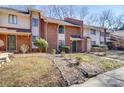 Townhome complex exterior, showcasing multiple units and landscaping at 8465 Ramath Dr, Charlotte, NC 28211