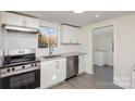 Modern kitchen with stainless steel appliances and granite countertops at 1464 Bradford Heights Rd, Gastonia, NC 28054
