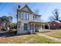 Needs some TLC, but great potential in this two story home at 415 S Race St, Statesville, NC 28677