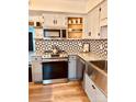 Modern kitchen with granite countertops and stainless steel appliances at 8838 Hunter Ridge Dr, Charlotte, NC 28226