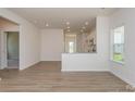 Open living space showcasing seamless flow to the kitchen, creating an inviting atmosphere at 1630 Troon Dr, Salisbury, NC 28144