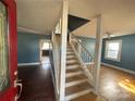 Classic staircase leading to the upper level at 3 Kingston St, Belmont, NC 28012