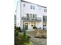 Private backyard patio with deck and seating area at 8052 Cedarsmith Ct, Charlotte, NC 28217