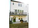 Private backyard patio with deck and seating area at 8052 Cedarsmith Ct, Charlotte, NC 28217