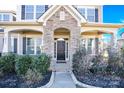 Inviting front entrance with stone columns and a double door at 1022 Torrens Dr # 4, Monroe, NC 28110