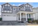 Two-story house with gray siding, white trim, and a welcoming front porch at 19117 Hawk Haven Ln, Charlotte, NC 28278