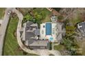 Aerial view showing house, pool, and backyard at 2130 Ferncliff Rd, Charlotte, NC 28211