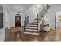 Bright entryway with hardwood floors and staircase at 2130 Ferncliff Rd, Charlotte, NC 28211