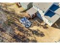 Backyard with fire pit, patio, and a partially visible deck at 273 Sweet Briar Dr, Fort Mill, SC 29707