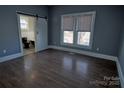 Bright bedroom with hardwood floors and an ensuite bathroom at 303 N Gaston St, Kings Mountain, NC 28086