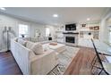 Spacious living area featuring a fireplace, built-in shelving, and large windows at 4440 Beechaven Dr, Rock Hill, SC 29732