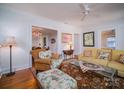 Bright living room with hardwood floors and comfortable seating at 523 W 2Nd Ave, Gastonia, NC 28052