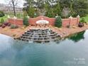 Lake Park community entrance with a fountain at 5606 Ginger Ln, Indian Trail, NC 28079