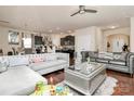 Spacious living room with hardwood floors and a sectional sofa at 6908 Agava Ln, Charlotte, NC 28215