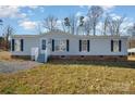 Well-maintained manufactured home on a landscaped lot at 820 Bethesda Rd, Statesville, NC 28677