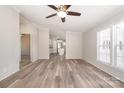 Spacious living room with vinyl flooring and ceiling fan at 820 Bethesda Rd, Statesville, NC 28677