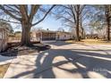 Large backyard with spacious patio, screened porch and gazebo at 10512 Roseberry Ct, Charlotte, NC 28277