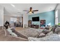 Spacious living room with sectional sofa, and adjacent dining area at 11906 Bending Branch Rd, Charlotte, NC 28227