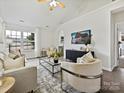 Spacious living room with vaulted ceiling, hardwood floors, and neutral decor at 173 Brookshire Dr, Fort Mill, SC 29715