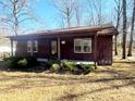 Ranch style home with covered porch and mature trees at 1993 Powell Ave, Lancaster, SC 29720