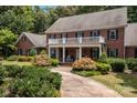 Two story brick home with landscaped yard and driveway at 210 W Glenview Dr, Salisbury, NC 28147