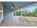Deck overlooking a backyard with privacy hedge at 502 E 2Nd St, Salisbury, NC 28146