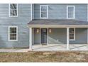 House exterior, featuring a front porch with white columns and a gray door at 502 E 2Nd St, Salisbury, NC 28146