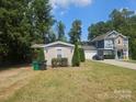 Property includes a single-wide mobile home and a larger home at 5024 Victoria Ave, Charlotte, NC 28269