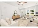 Bright living room featuring a neutral color palette and comfy seating at 7601 Boswell Rd, Charlotte, NC 28215