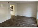 Bright living room with laminate flooring at 10006 White Cascade Dr, Charlotte, NC 28269