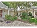 Charming home exterior with lush landscaping and welcoming walkway at 1077 Sardis Cove Dr, Charlotte, NC 28270