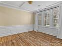 Formal dining room with hardwood floors and large windows at 11052 Preservation Park Dr, Charlotte, NC 28214